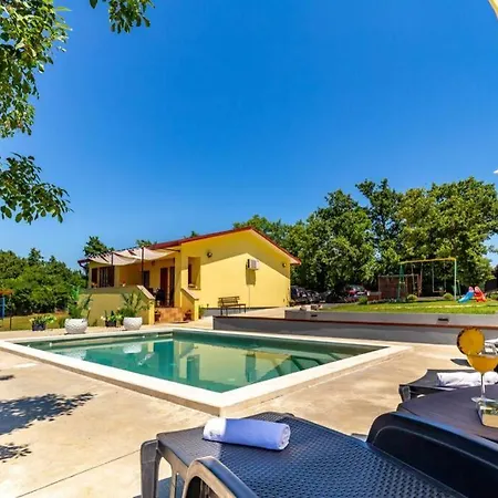 Sunny Yellow House With A Pool Stokovci
